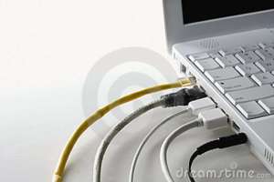 cords-plugged-laptop-computer-12976791